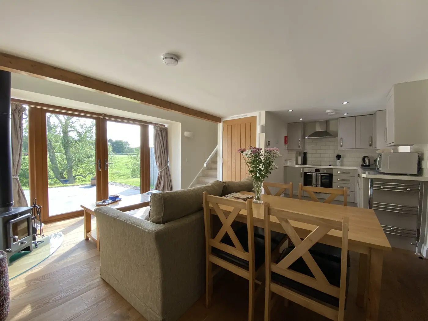 Dinning and living room space with a kitchen